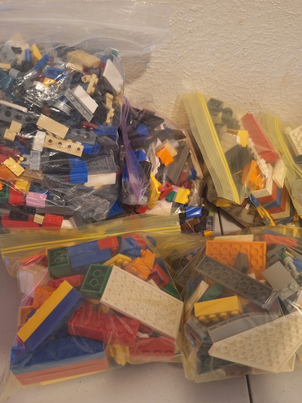 Lego Mixed Building Bricks in Blue, Red, Yellow, White, Green, Gray, Tan